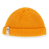 Czapka dokerka Hansa Wear x Buzia Zauer z wełny z merino POMARAŃCZOWY
